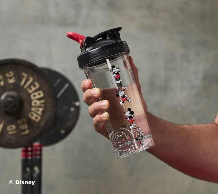 pro-series-p0 Mickey_Mouse_Protein_Shaker_Bottle_Being_Held_In_the_Gym.jpg